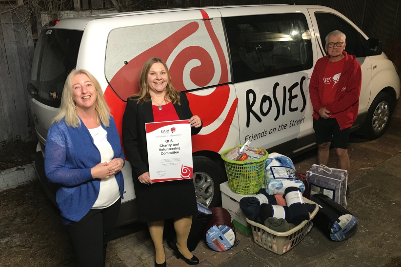QLS charity committee donating goods to Rosies