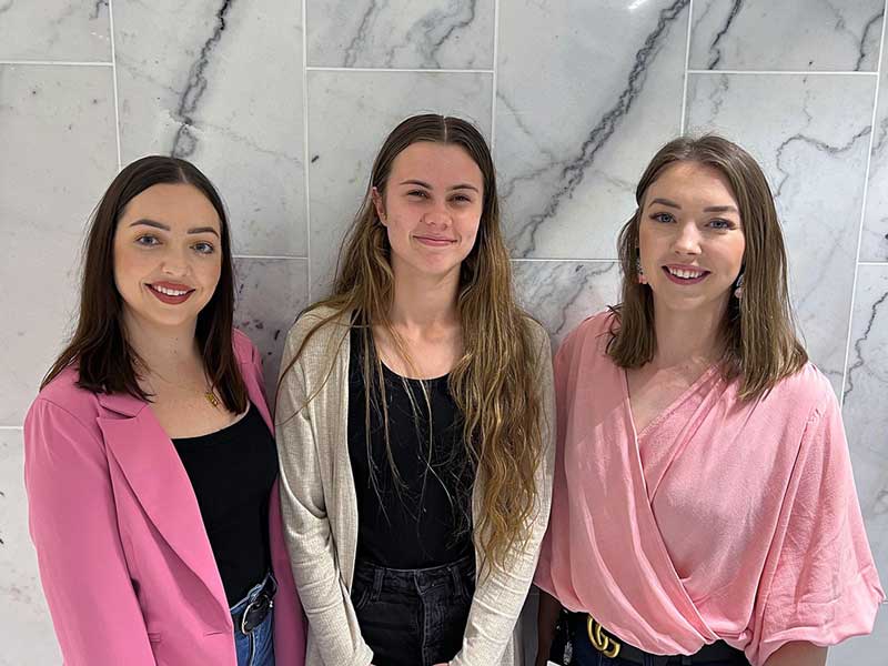 High school student Ehla (centre), with Carter Newell Lawyers People and Culture Advisor Kailee and Marketing Coordinator Cassandra.