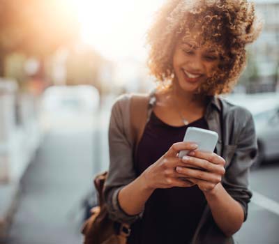 Woman texting on mobile