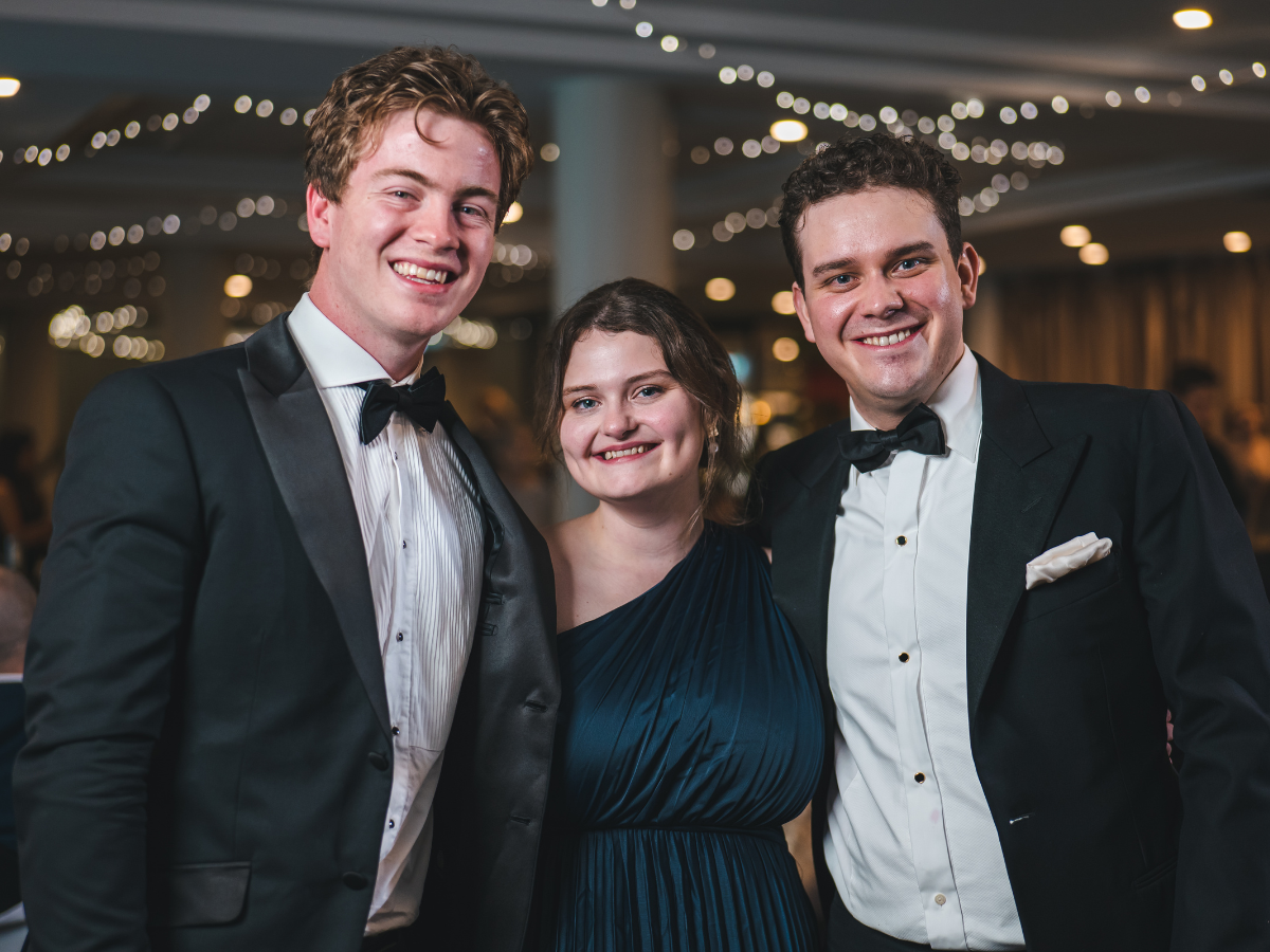 Stafford Mortensen (L) at the Downs and South Western Queensland Law Association Law Ball, with his colleagues Gemma Holland and James Halliday