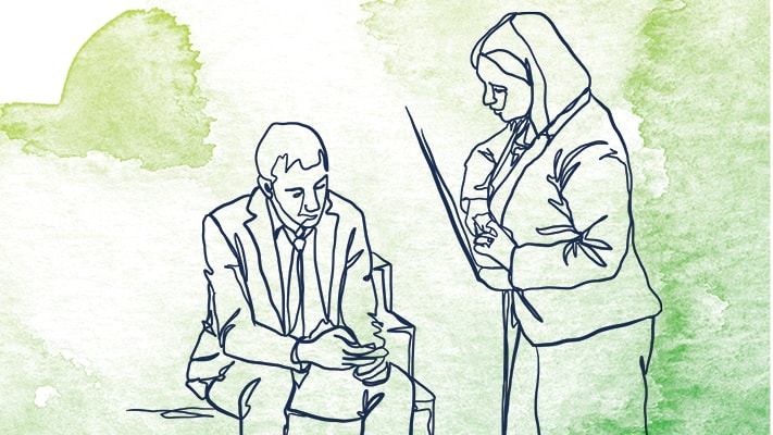 Outline of a man sitting and a woman standing